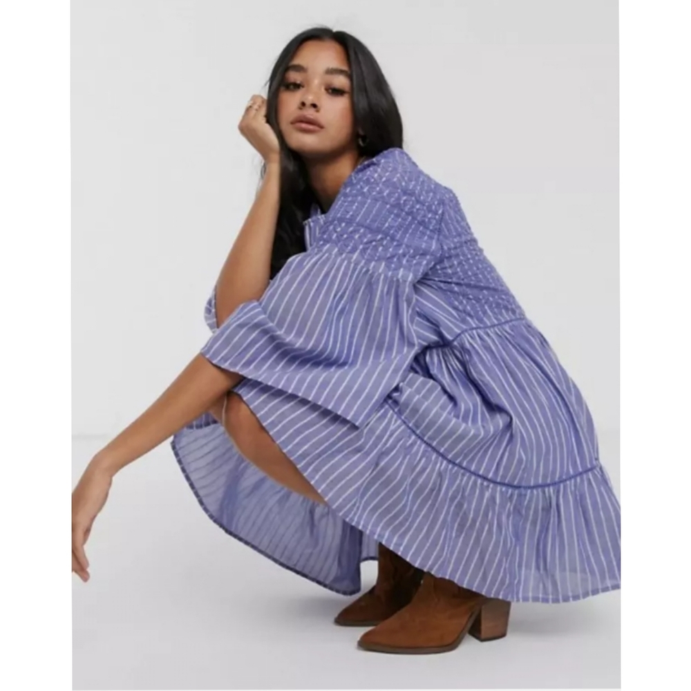 Free people Lola embroidered mini dress size small. Blue white baby doll dress.